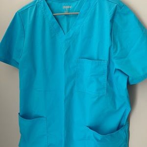 Scrub top with pockets